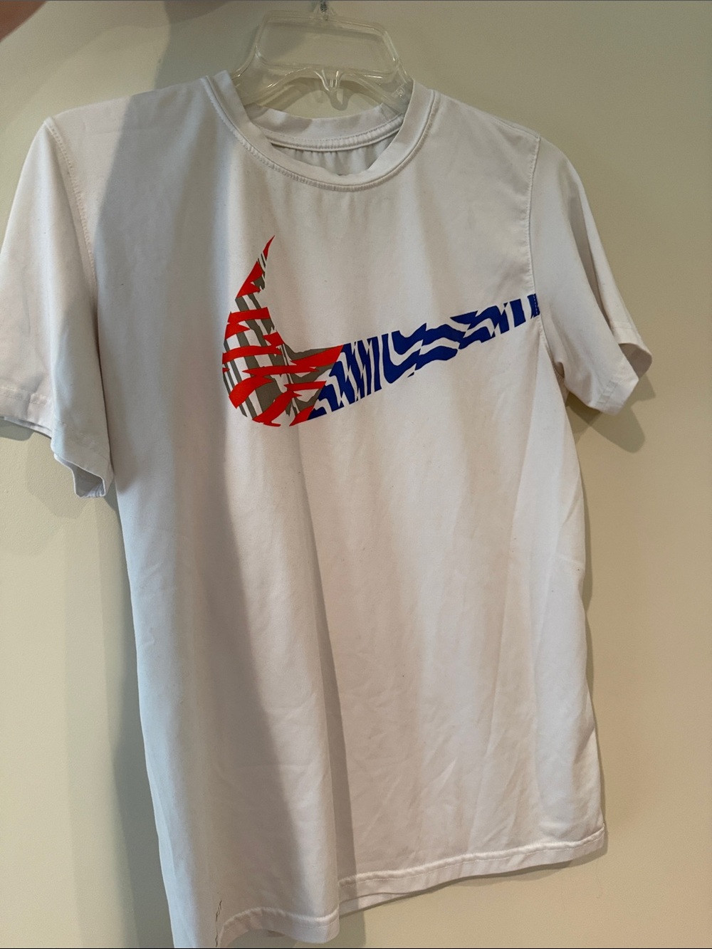 Nike White T‑Shirt with Red & Blue Patterned Swoosh